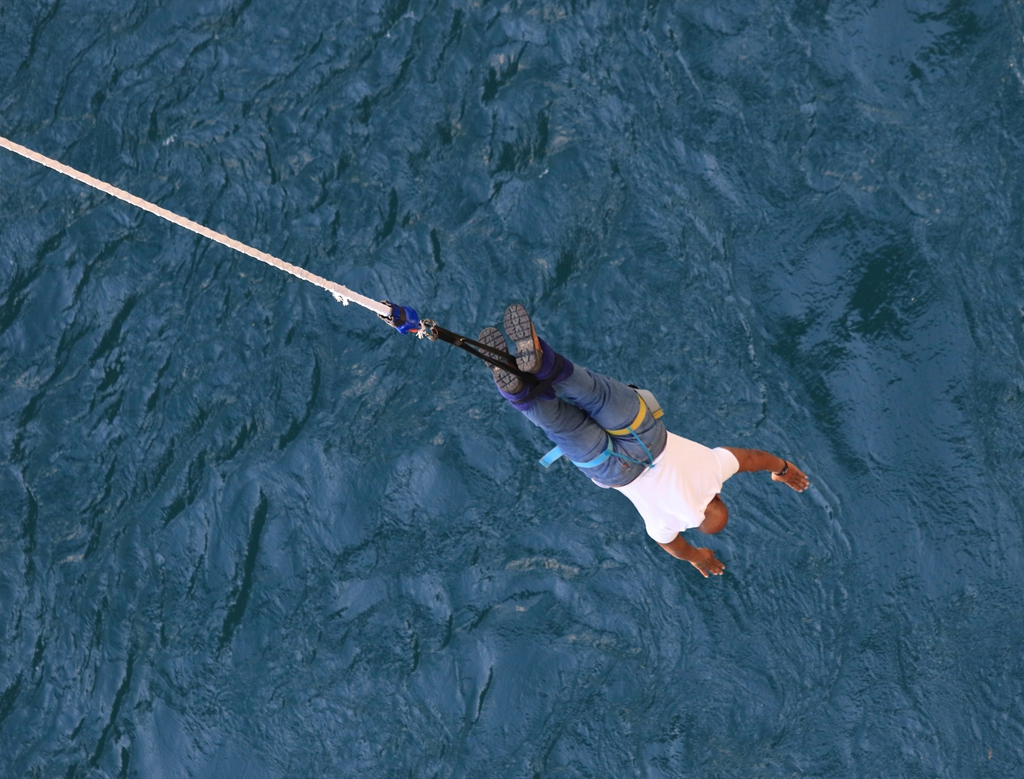 Swinging beneath the bridge