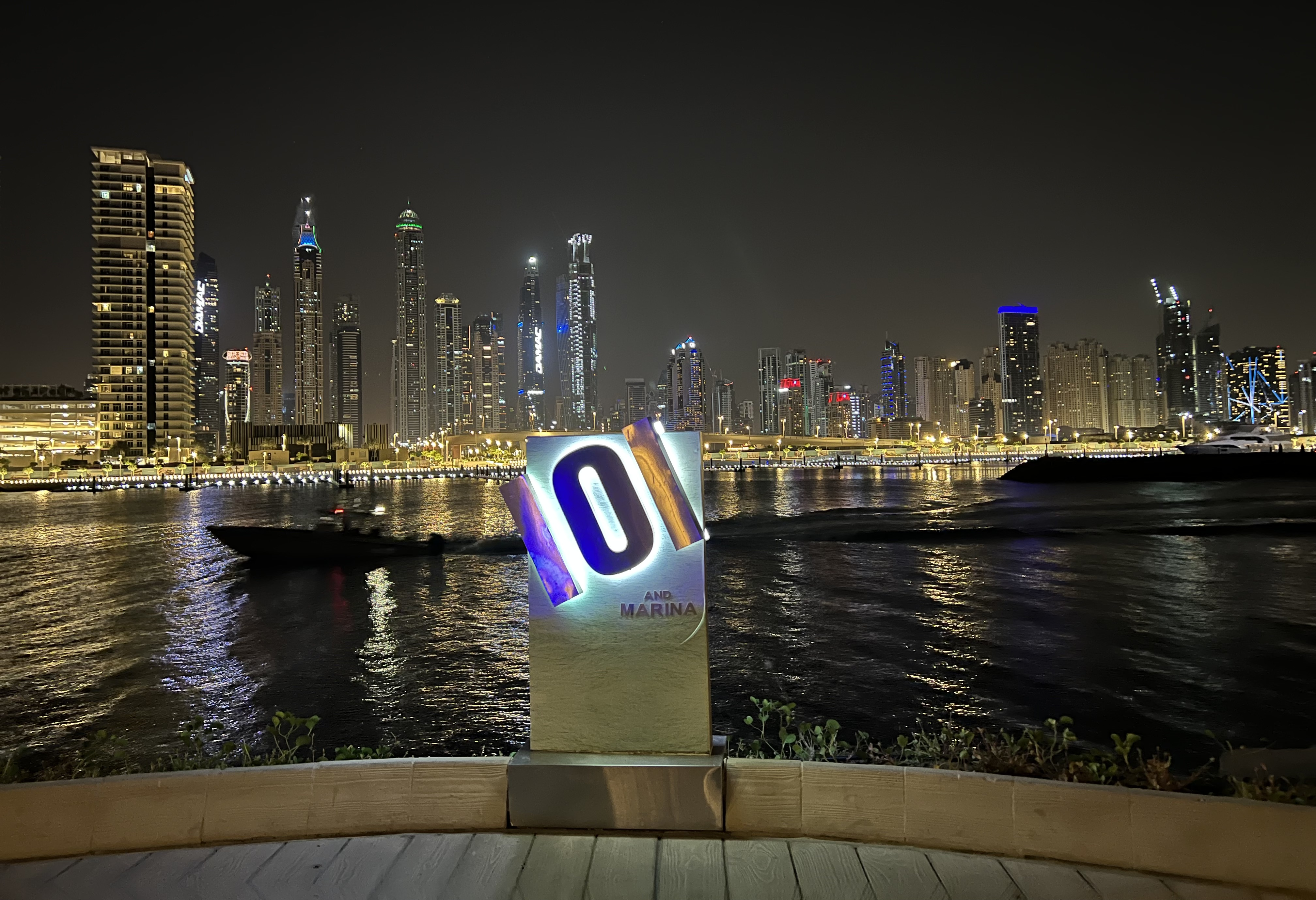 101 marker overlooking Dubai Marina skyline